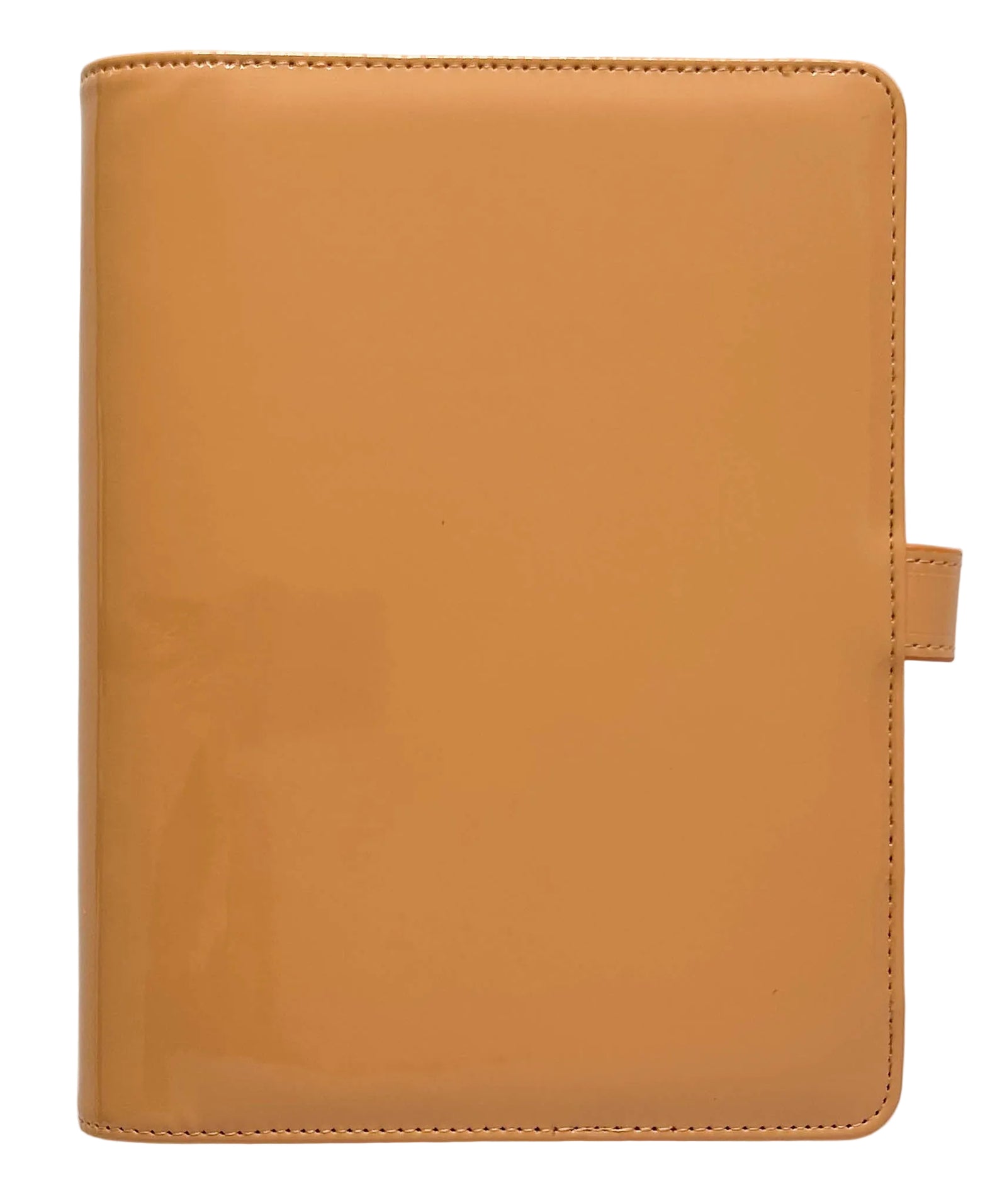 A tan vegan leather planner cover with a glossy finish, shown closed against a plain white background.